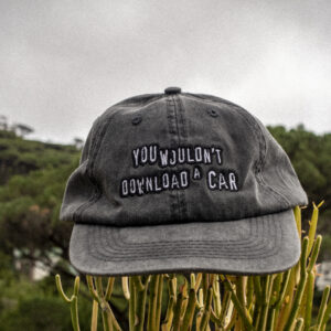 Dad cap displaying the slogan, "You wouldn't download a car". New cap, funny cap, camper cap, washed cotton, Irony, Humor, meme, Brass clasp.