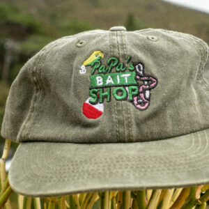Faded olive green dad cap displaying a logo for a fictional bait and tackle shop, called "Papa's Bait Shop". Everyone loves a vintage fishing cap. New cap, funny cap, camper cap, washed cotton, Irony, Humor, meme, Brass clasp. Fishing hat.