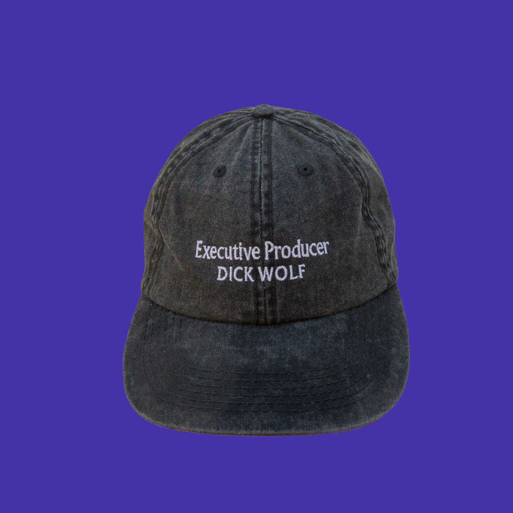 Executive Producer Dick Wolf embroidered onto a black dad cap